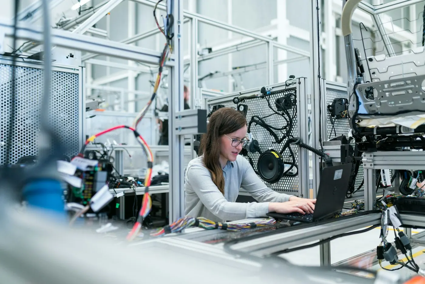 Engineer working with industrial automation equipment